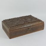 An Indian carved hardwood stationery box,