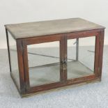 A 19th century oak cased shop display cabinet,