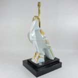 An Italian pottery table lamp, in the form of an eagle,