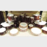 A collection of Poole pottery brown glazed dinner wares