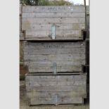 A collection of three large wooden apple crates,