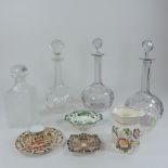 A collection of three 19th century glass decanters, a modern decanter,