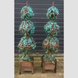 A pair of artificial ivy ball plants,