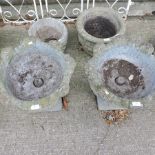 A pair of reconstituted stone garden planters, 43cm tall,