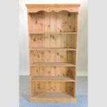 A modern pine standing open bookcase,