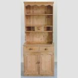 A pine dresser of small proportions,