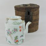 A 19th century Cantonese teapot, 14cm tall,