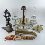 A collection of items to include a brass military bugle, wig stand, decanter,
