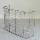 A 19th century brass and wire fire screen,