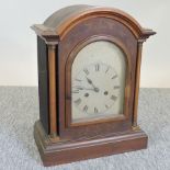 An early 20th century inlaid walnut cased bracket clock, 42cm tall,