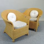 A pair of wicker armchair,