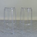 A pair of perspex bar stools, Charles Ghost by Kartell,