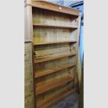 A modern pine standing open bookcase,