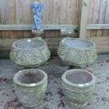 A pair of reconstituted stone garden planters, 48cm tall, together with a pair of stands,