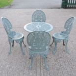 A French grey painted aluminium garden table and a set of four matching chairs