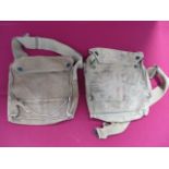 Two WW1 American Gas Mask Satchels light khaki canvas bags with top flaps secured by “pull the