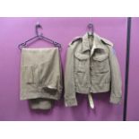 1937 Battle Dress and Trouser Set consisting khaki single breasted closed collar short jacket.