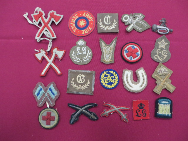 Selection of Various Trade Proficiency Badges embroidery examples include KC over LG on scarlet