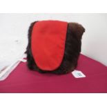 Royal Artillery Officer’s Busby. A dark fur example by Hobsons. Plain scarlet cloth busby bag on