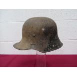 WW1 Imperial German Helmet Battle Damaged Shell steel crown of typical form with lower rolled