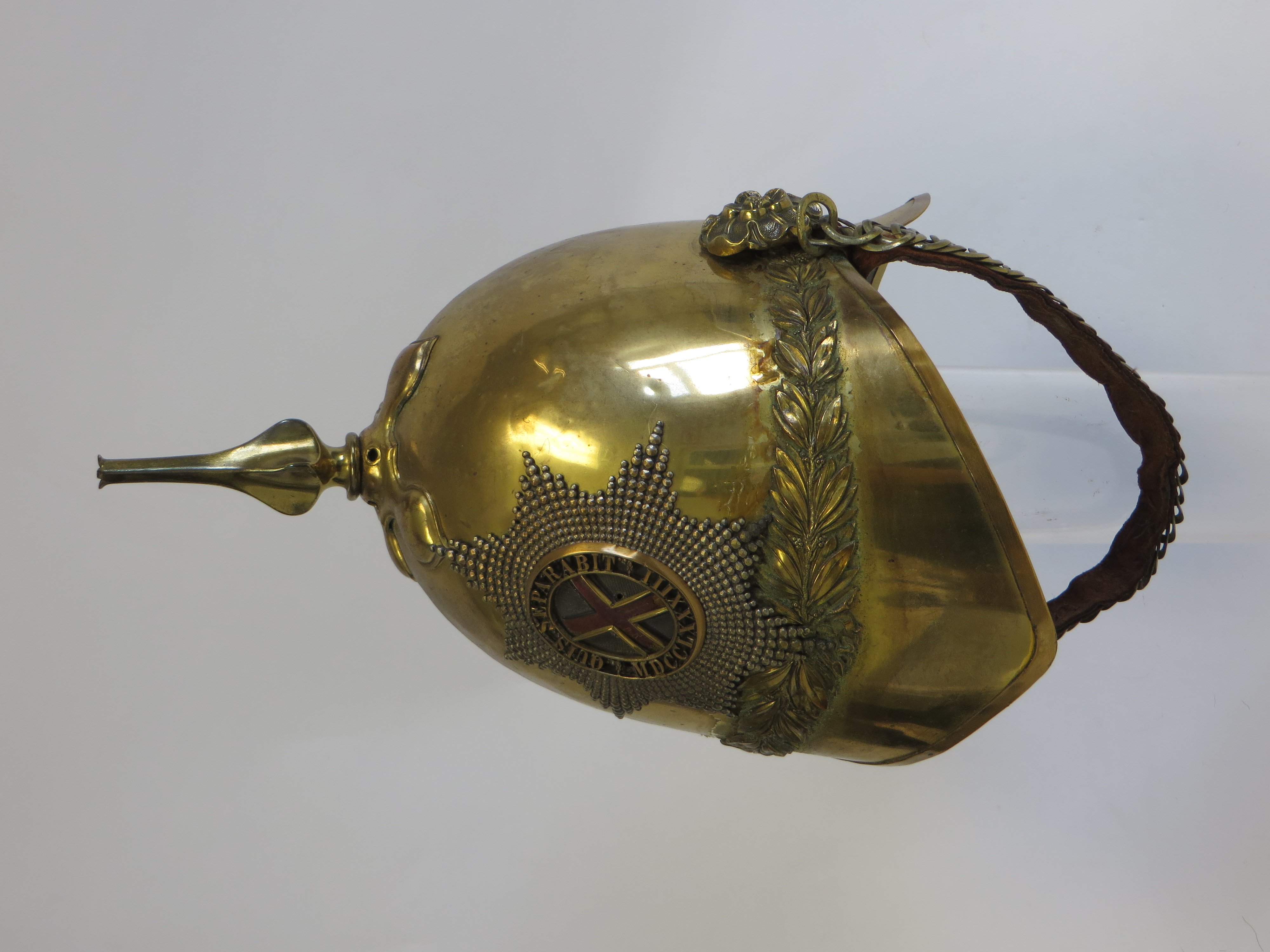 4th Royal Irish Dragoon Guards Officer’s Helmet brass high crown with swept rear tail and pointed