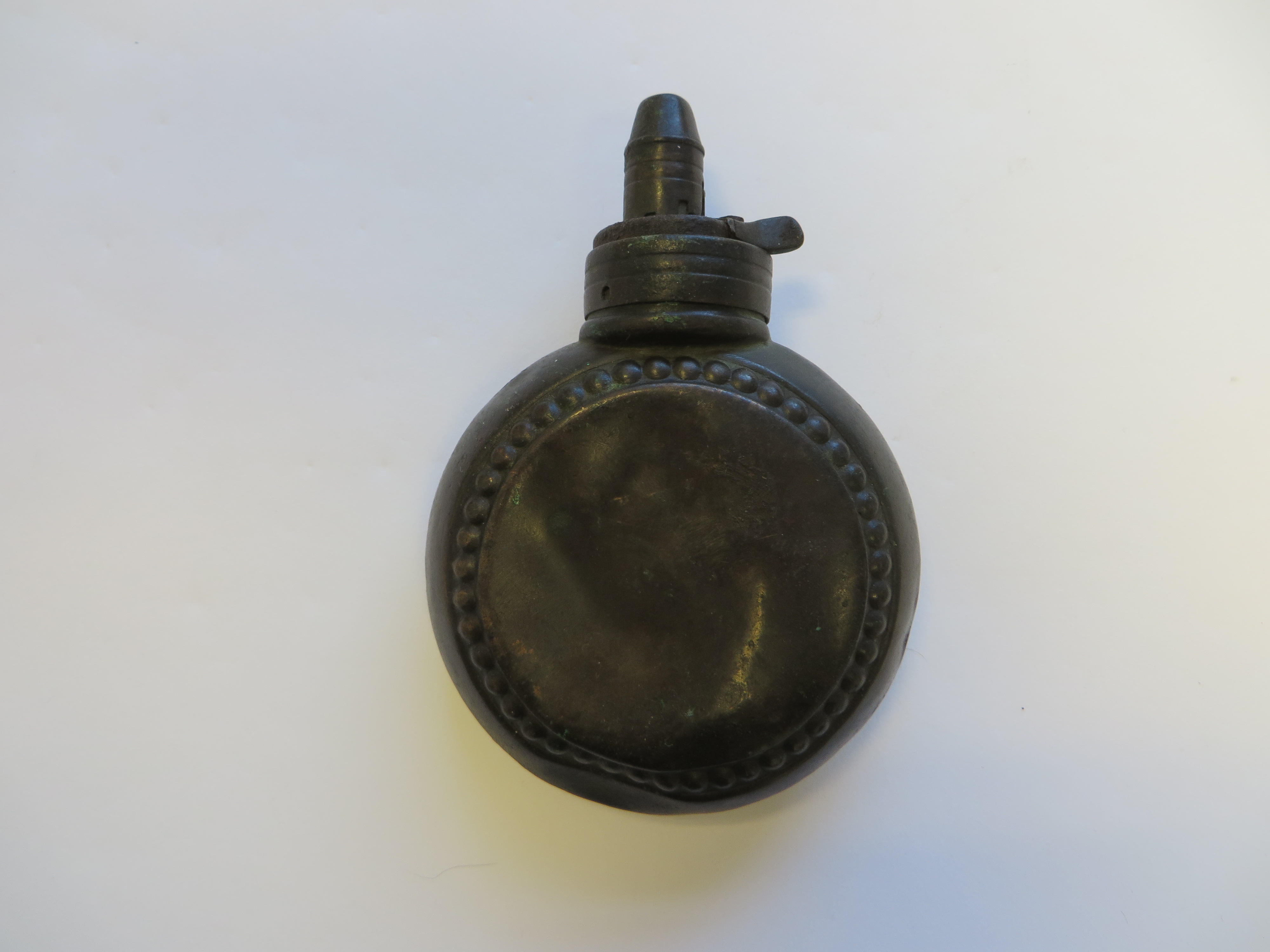 19th Century Disk Shape Flask copper disk flask with stud design edging. Brass top with graduated