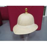 Royal Marines Officer’s White Wolseley Helmet cream six panel linen crown. Pointed peak and square