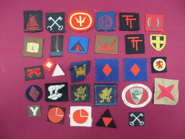 Selection of Infantry Formation Badges including leather and felt 1st Div ... Bevo weave 2nd Div ...