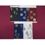 Selection of Corps Cap, Collar and Titles cap badges include KC brass ERVII RE ... KC brass GRV
