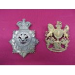 Two Victorian Other Ranks Home Service Helmet Plates consisting Vic crown white metal backing star