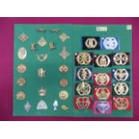 Small Selection of Dutch Badges including Cavalry, Artillery, Medical, Light Infantry and Transport.