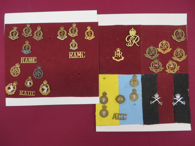 Selection of Corps Cap, Collar and Titles cap include Vic crown brass RAMC ... KC brass RAMC ...