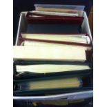 STAMPS : Box of various collections in 11 albums/stock books.