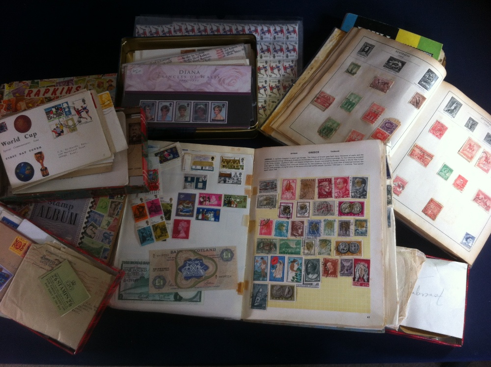 World accumulation of stamps in albums and tins,