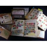 World accumulation of stamps in albums and tins,