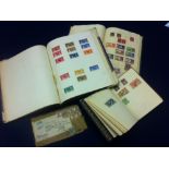 Three small albums with Great Britain and Commonwealth stamps including one album of GVI Coronation