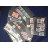 Commonwealth stamps on cards,