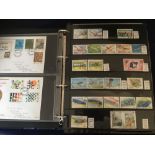 STAMPS : World selection in Safe stock album with mint & used sets & FDCs.