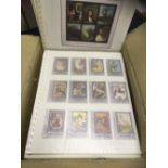 ART, approx 300 album pages with world selection mint, used, postcards, covers, mini-sheets etc.