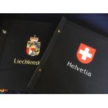 Switzerland and Liechtenstein Davo stamp albums, sparcely filled mint and used