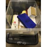 Two plastic tubs of various stamp accessories plus a few stamps , includes, mounts, hinges etc,