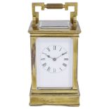A FRENCH GILT-BRASS CARRIAGE CLOCK, LATE 19TH CENTURY eight day movement striking on a gong, white