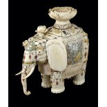 ˜A JAPANESE IVORY 'SHIBAYAMA' WORK FIGURE OF AN ELEPHANT, MEIJI PERIOD (1868-1912) carved standing