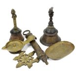 SIX BRASS OBJECTS, SOUTH INDIA, 19TH CENTURY comprising two priest's temple bells, a ritual oil