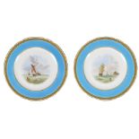 A PAIR OF MINTON PLATES, CIRCA 1865 one painted with a Thames sailing barge, the other with a twin
