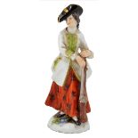 A MEISSEN MINIATURE FIGURE OF A SPORTSWOMAN, LATE 19TH CENTURY the black hatted lady holding her