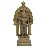 A SHRINE DEPICTING VISHNU, SOUTH INDIA, 19TH CENTURY bronze and brass, in three sections, the bronze