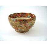 A JAPANESE SATSUMA BOWL, MEIJI PERIOD (1868-1912) painted with millefleurs decoration, signed 17.5cm