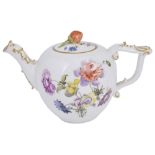 A MEISSEN SMALL TEAPOT AND COVER, CIRCA 1760 brightly painted with sprays and bouquets of summer