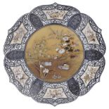 ˜A JAPANESE INLAID IVORY AND SILVER DISH, MEIJI PERIOD (1868-1912) of flowerhead form, the central